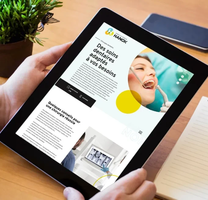 Dentisterie Hanok website on a tablet